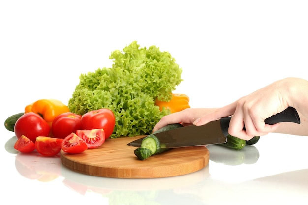 Hands chopping vegetables